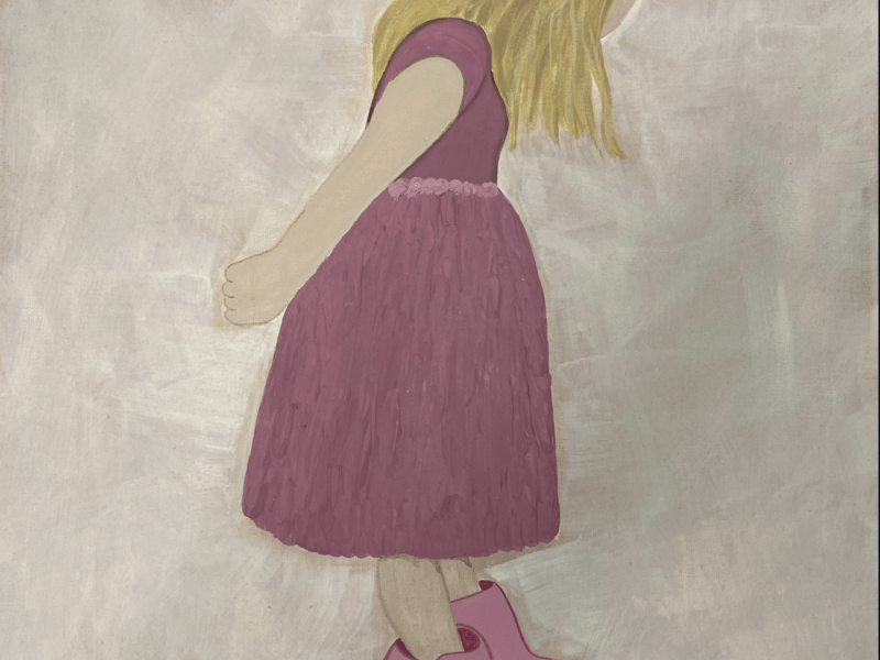 Image of a girl looking down at her shoes.