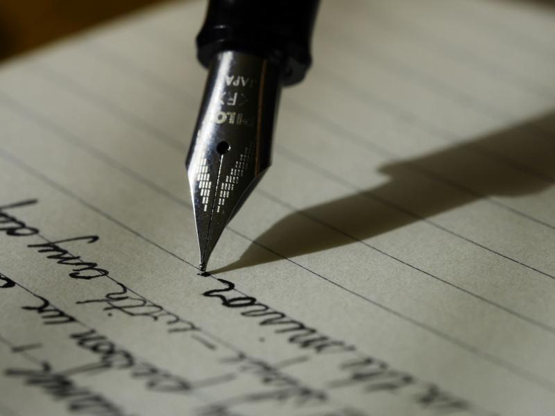 Image of a pen on paper.