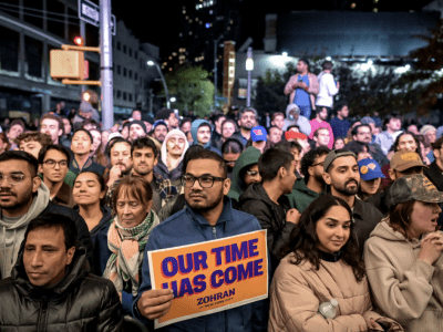 Supporters of Zohran Mamdani, who will be New York’s first Muslim mayor, listening to his victory speech on Tuesday night.Credit...Victor J. Blue for The New York Times