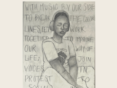 Image of a girl listening to music through her headphones.