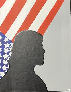 Silhouette of a woman with flag.