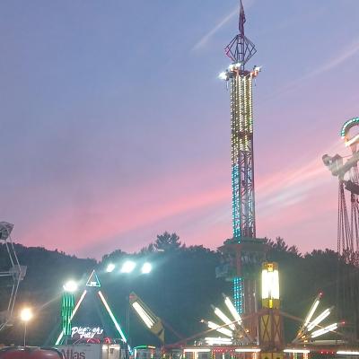 The fair at night with a beautiful sky