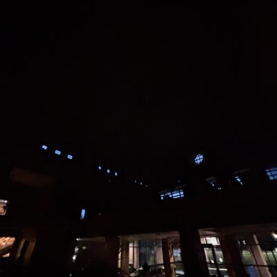 A dimly-lit building. 