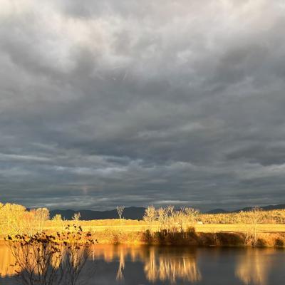 A river and fields. 