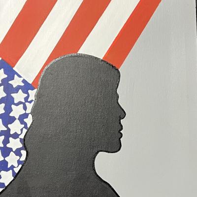Silhouette of a woman with flag.